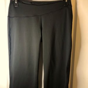 Women’s Brooks workout pants, black. Size L.
